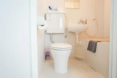 a bathroom with a toilet and a sink at Asakusa 5 Chome One Bedroom KazeNoItsu 201 in Tokyo