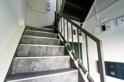 a set of stairs in a building at Asakusa 5 Chome One Bedroom KazeNoItsu 201 in Tokyo
