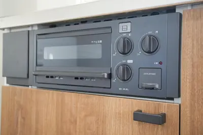 a microwave oven sitting on top of a cabinet at Asakusa 5 Chome One Bedroom KazeNoItsu 401 in Tokyo