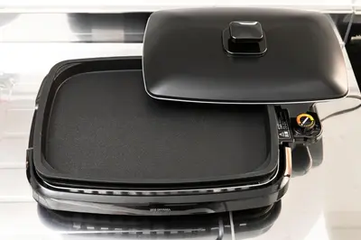 a black suitcase sitting on top of a table at FIKA Shibuya Honmachi 301 in Tokyo
