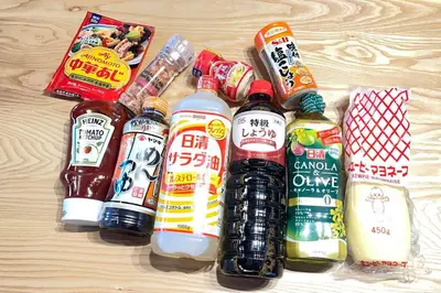 a group of food and drinks on a wooden table at Ohanajaya 3min Garden View House 4 beds in Tokyo