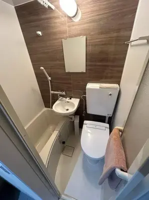 a small bathroom with a toilet and a sink at Yamato Residence Katsushika,10min toAsakusa Japanese style 1LDK Max10ppl in Tokyo