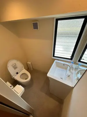 a small bathroom with a toilet and a sink at Yamato Residence Katsushika,10min toAsakusa Japanese style 1LDK Max10ppl in Tokyo