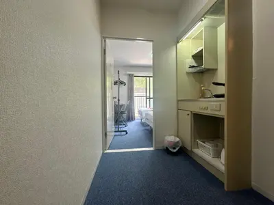 a room with a hallway with a sink and a mirror at Akabane Apart ment Wei hefuyan7190 in Tokyo