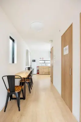 a dining room with a table and chairs at \u6771\u5411\u5cf66\u4e01\u76ee in Tokyo