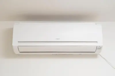 a white television sitting on top of a shelf at \u9ce5\u8d8a\u4e00\u6237\u5efa in Tokyo