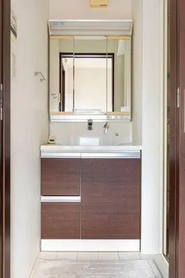 a bathroom with a sink and a mirror at Crown\u6d77\u8fba in Tokyo