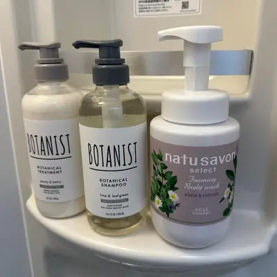 three bottles of moisturizers sitting on a shelf in a refrigerator at Style Lab\u304a\u82b1\u8336\u5c4b1 in Tokyo