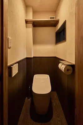 a small bathroom with a toilet in a room at Rojiura in Tokyo