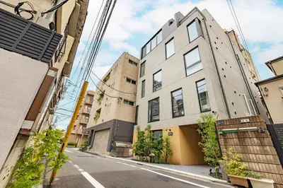 an apartment building on a city street at 67 Apt Kagurazaka Premium in Tokyo