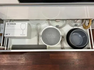 a cabinet filled with different types of appliances at Tatami-Tokyo studio apartment in Tokyo