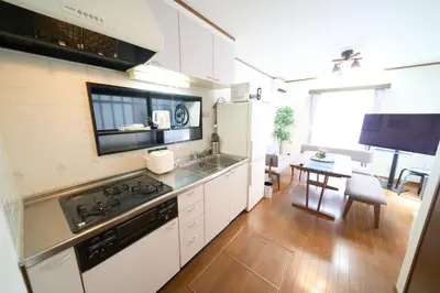 a kitchen with a sink and a stove top oven at Toshima-ku - House - Vacation STAY 17508 in Tokyo