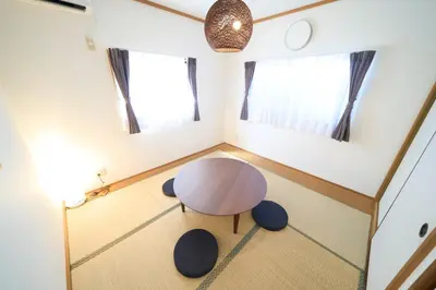 a small room with a table and two windows at Toshima-ku - House - Vacation STAY 17508 in Tokyo
