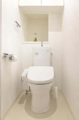 a bathroom with a white toilet in a room at Tsubasa Home in Tokyo