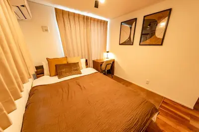 a bedroom with a large bed in a room at HOTEL Grand Star Tokyo in Tokyo