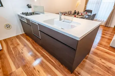 a kitchen with a sink and a stove at HOTEL Grand Star Tokyo in Tokyo