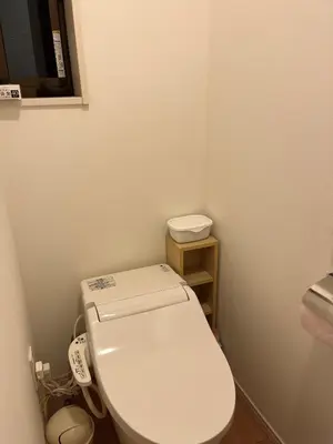 a bathroom with a white toilet in a room at Miaoyi Asakusa in Tokyo