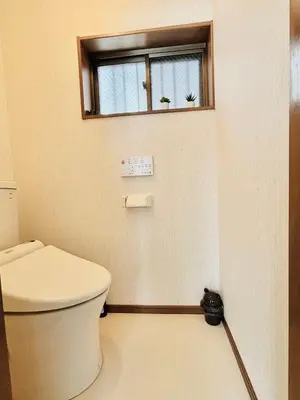 a bathroom with a toilet and a window at Holiday Akabane House - A Traditional Japanese House in Tokyo, with Direct Access to Shinjuku & Shibuya in Tokyo