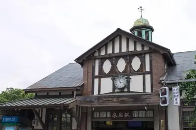 a building with a clock on the front of it at \u97d3\u56fd\u65b0\u5927\u4e45\u4fdd\u901a\u308a\u3059\u3050\u306e\u4e00\u8ed2\u5bb6\u3067\u697d\u3057\u3080\u6771\u4eac\u65c5\u884c8\u540d\u69d8 Korea Shinokubo off the street A house for 8pax in Tokyo