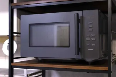a microwave oven sitting on top of a shelf at 1 line to Asakusa! Projector, 5 mins walk from Togoshi-ginza Sta in Tokyo