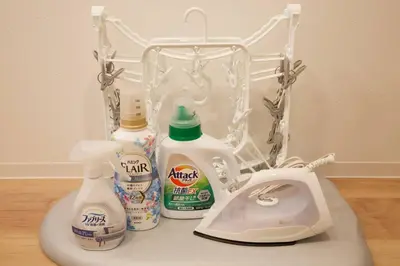 a group of bathroom items on a counter with a phone at The Geminis Ikebukuro301 in Tokyo