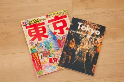 two magazines sitting on top of a table at The Geminis Ikebukuro301 in Tokyo