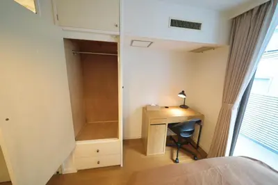 a bedroom with a desk and a closet at Nakagawa Building - Vacation STAY 17546 in Tokyo