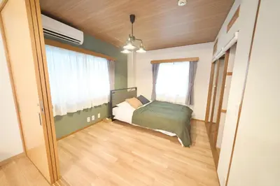 a small bedroom with a bed and a window at Nakagawa Building - Vacation STAY 17546 in Tokyo