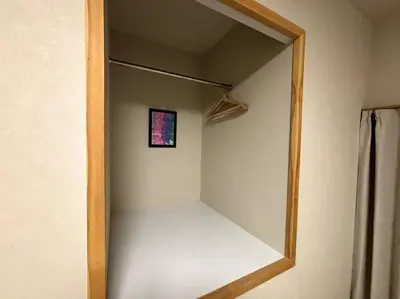 a mirror on a wall in a room at \u6771\u6d45\u83492\u4e01\u76eeb201 in Tokyo