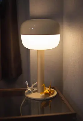 a lamp on a table with two birds on it at Zen Abode404 Japanese-style and modern Western-style rooms in Tokyo