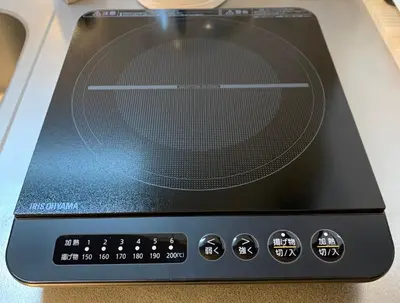 a toaster oven sitting on top of a stove at Zen Abode404 Japanese-style and modern Western-style rooms in Tokyo