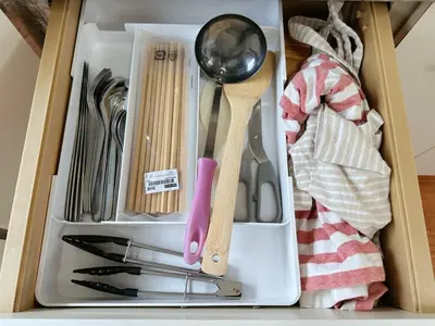 a drawer filled with utensils and a spoon at W-inns okazaki in Tokyo