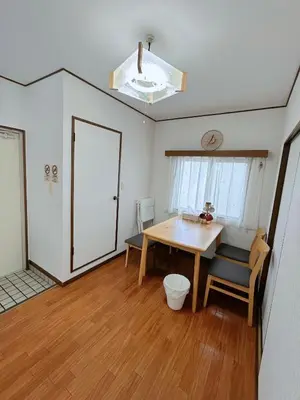 a dining room with a table and a window at W-inns okazaki in Tokyo