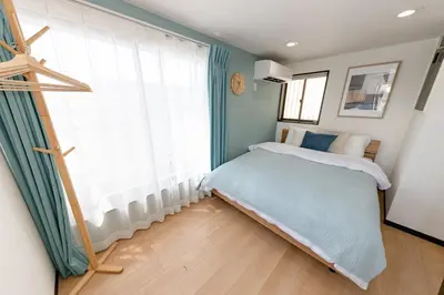 a small bedroom with a bed and a window at Tate Stay,TOKYO - Vacation STAY 96712 in Tokyo