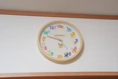 a clock on a wall with flowers on it at Itabashi Minamicho ten, Diamond Yu - Vacation STAY 61425v in Tokyo