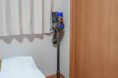 a camera is on a tripod next to a bed at Itabashi Minamicho ten, Diamond Yu - Vacation STAY 61425v in Tokyo