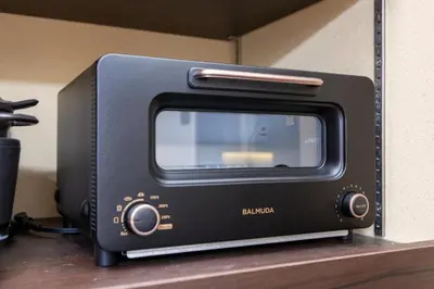 a black toaster oven sitting on top of a counter at Asakura Ninja House Tokyostoryhotel, Tokyo Skytree in Tokyo