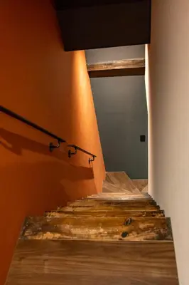 a set of stairs with a mirror on the wall at Asakura Ninja House Tokyostoryhotel, Tokyo Skytree in Tokyo