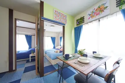 a room with a dining table and a bedroom at Belmont 301 3min to Station Easy Access Ueno Asakusa Skytree Sleeps 5 in Tokyo