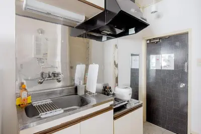 a kitchen with a sink and a counter top at Maison Shin Nakano 203 MS23 in Tokyo