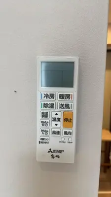 a remote control is attached to a wall at Shibuya Center-\u6e0b\u8c37\u7ad9\u5f92\u6b654min-\u65b0\u5bbf\u516d\u672c\u6728\u4e0a\u91ce\u76f4\u8fbe-New Open Max4P in Tokyo