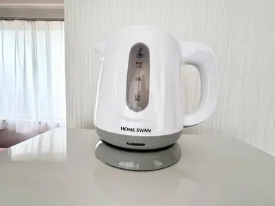 a white mixer sitting on top of a counter at Ikebukuro-Kanamecho Studio - 2 Seconds from Kanamecho Station - Comfortable & Central 3F in Tokyo
