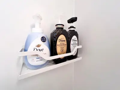 a shelf with three bottles of hair products on it at Ikebukuro-Kanamecho Studio - 2 Seconds from Kanamecho Station - Comfortable & Central 3F in Tokyo