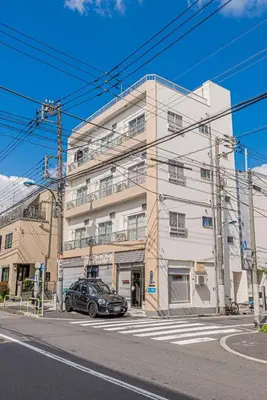 a car parked in front of a building at mori house\u897f\u304c\u4e18 in Tokyo