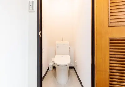 a bathroom with a white toilet in a room at Benir Maison Izumi in Tokyo