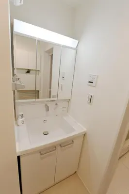 a white bathroom with a sink and a mirror at GM3442 Three-story Japanese-style villa in Shinjuku in Tokyo