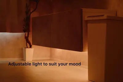 a room with a vase on a shelf and a wall at Cosmo in Tokyo