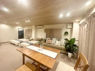 a living room with a couch and a table at Ginza 201,Tsukiji 3 mins,Tsukiji Market in Tokyo