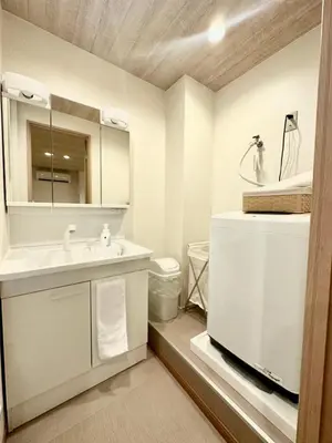 a bathroom with a sink and a mirror at Ginza 201,Tsukiji 3 mins,Tsukiji Market in Tokyo