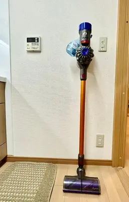 a mask on a baseball bat in a room at Ginza 201,Tsukiji 3 mins,Tsukiji Market in Tokyo